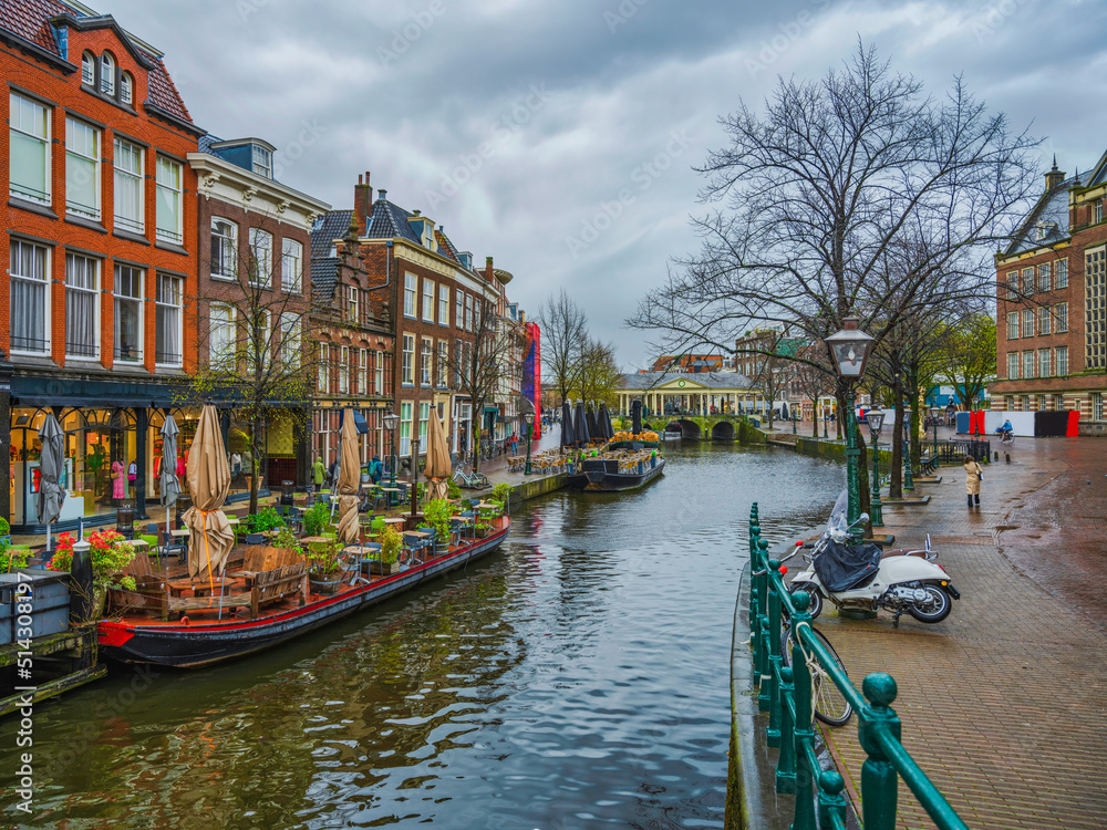 Colourful Dutch houses on canal side in Leiden, Netherlands