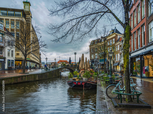 Canal  Dutch buildings and bridge in Leiden  Netherlands