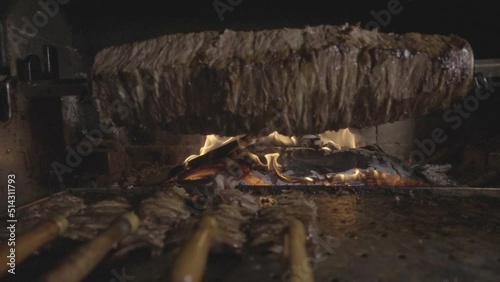 Details of the master and delicious kebab making Turkish kebab by the hearth