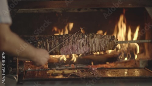 Details of the master and delicious kebab making Turkish kebab by the hearth