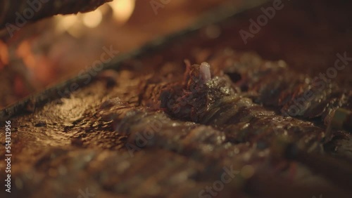 Details of the master and delicious kebab making Turkish kebab by the hearth