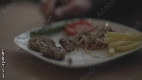 preparing, cooking and serving Turkish meatballs