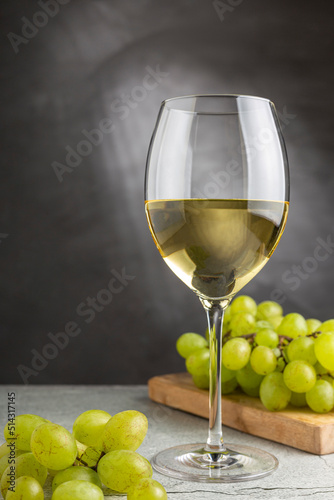 Glass of white wine on the table.