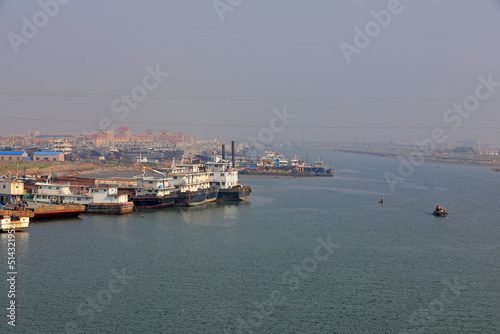 Many ships are at a fishing port wharf in North China