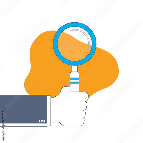 Businessman hand holding a magnifying glass.