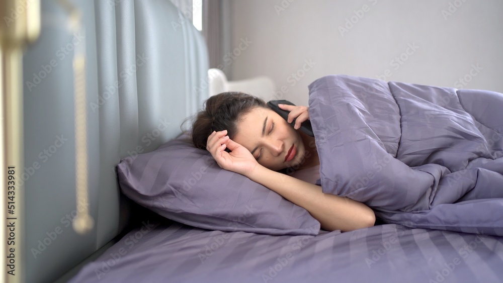 Lazy young woman get up late in morning. Lazy young woman get up late in morning.