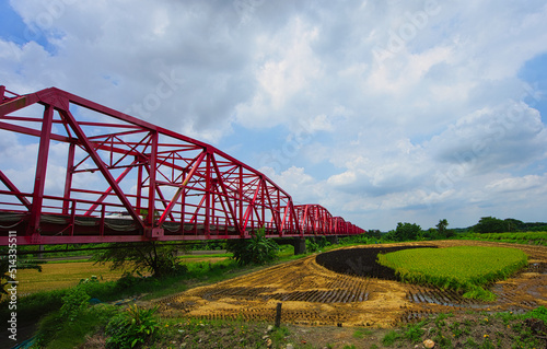 The Xiluo Bridge is a red steel bridge with concrete piers. This bridge, across the lower reaches of the Zhuoshui River in Yunlin County, Taiwan.