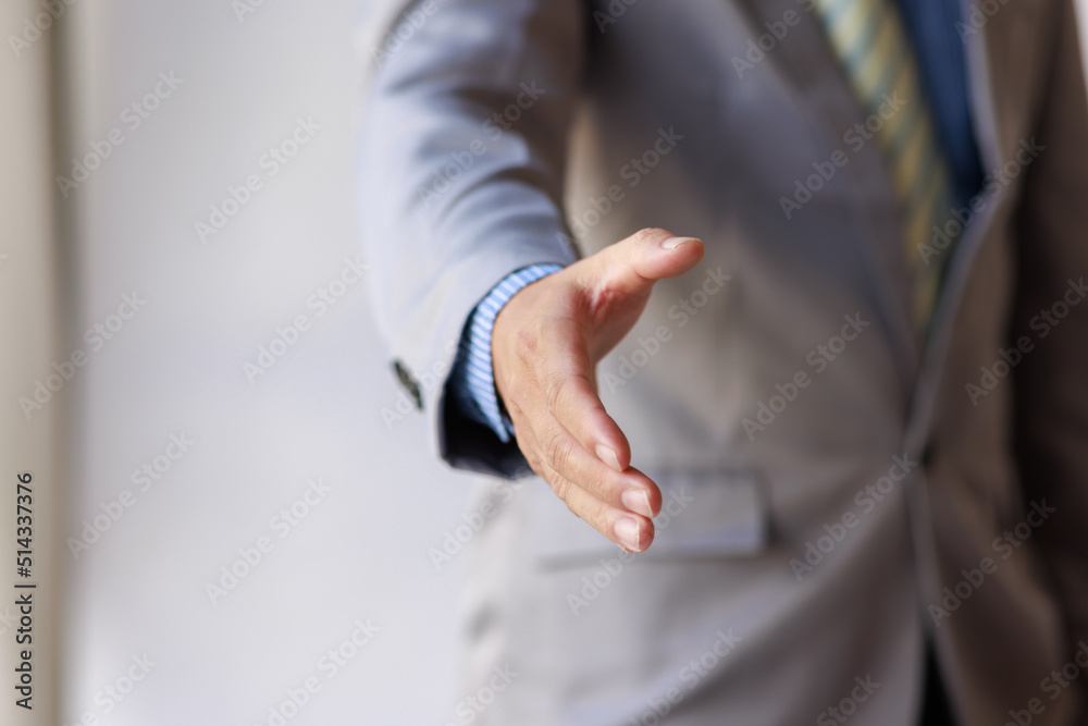 Business handshake for teamwork of business merger and acquisition,successful negotiate,hand shake,two businessman shake hand with partner to celebration partnership and business deal concept Business handshake for teamwork of business merger and acquisition,successful negotiate,hand shake,two businessman shake hand with partner to celebration partnership and business deal concept