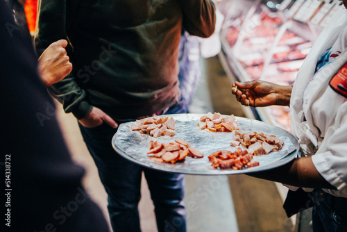 Photography Tasting sausage at St. Lawrence Market in Toronto, Canada