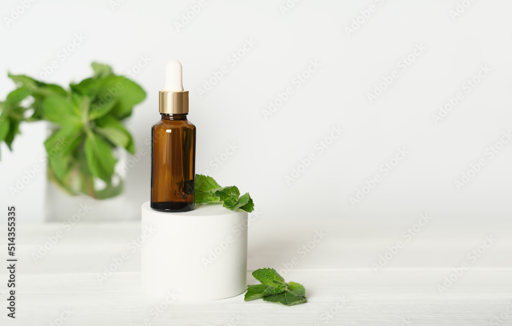 amber glass dropper pipette bottle on a podium with plant leaves. natural cosmetic serunm, anti age and wrinkle care. collagen peptide and hyaluronic acid care. amber glass dropper pipette bottle on a podium with plant leaves. natural cosmetic serunm, anti age and wrinkle care. collagen peptide and hyaluronic acid care.