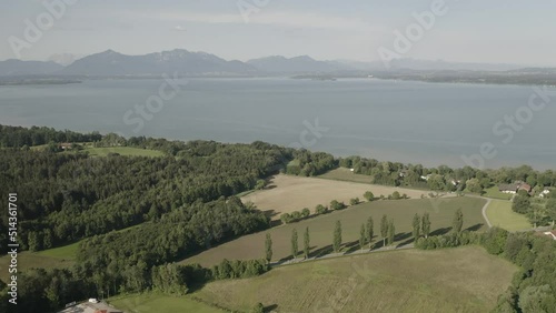 Chiemsee Lake Bavaria Aerial flight 4K. Ising Chiemgauer Alpen photo