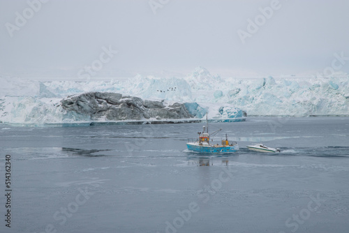 Fishing boat and icebergs, Greenland