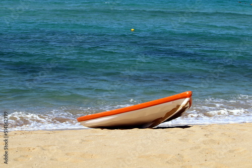 The boat stands on the beach on the Mediterranean Sea
