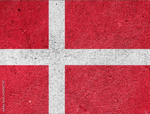 National flag of Denmark on a plastered wall