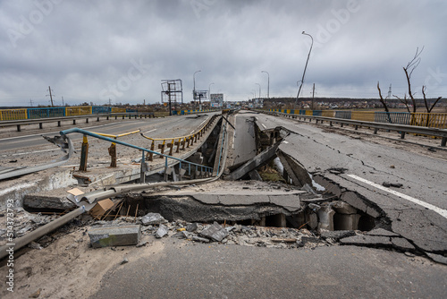 Hostomel, Kyev region Ukraine - 09.04.2022: Cities of Ukraine after the Russian occupation. Bridge over the river Irpin. The bridge was blown up to prevent Russian troops from passing through.