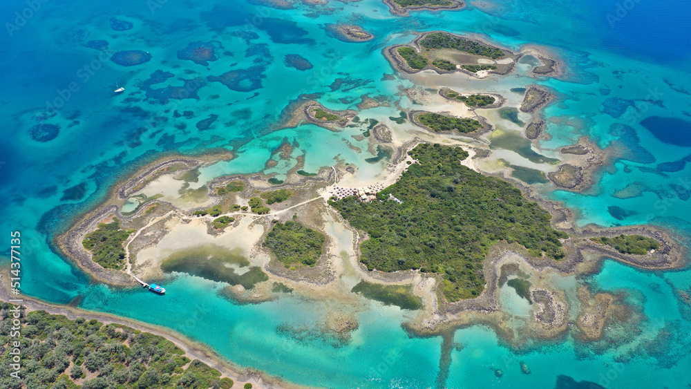 Aerial drone photo of paradise volcanic island complex resembling a blue lagoon archipelago in exotic destination bay with deep turquoise sea and crystal clear water beach