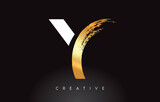 Golden Y Letter Logo with Brush Stroke Artistic Look on Black Background Vector