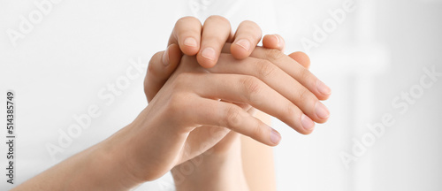 Hands of beautiful young woman at home, closeup