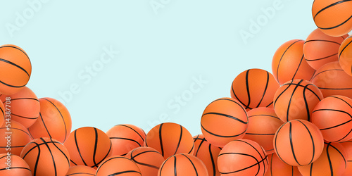 Many basketball balls on light blue background with space for text