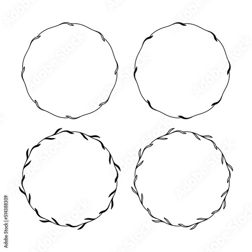 Set of 4 hand drawn spring wreaths isolated on white background, vector. Outline and silhouette frames with leaves. Doodle style.Collection of floral monogram frames.