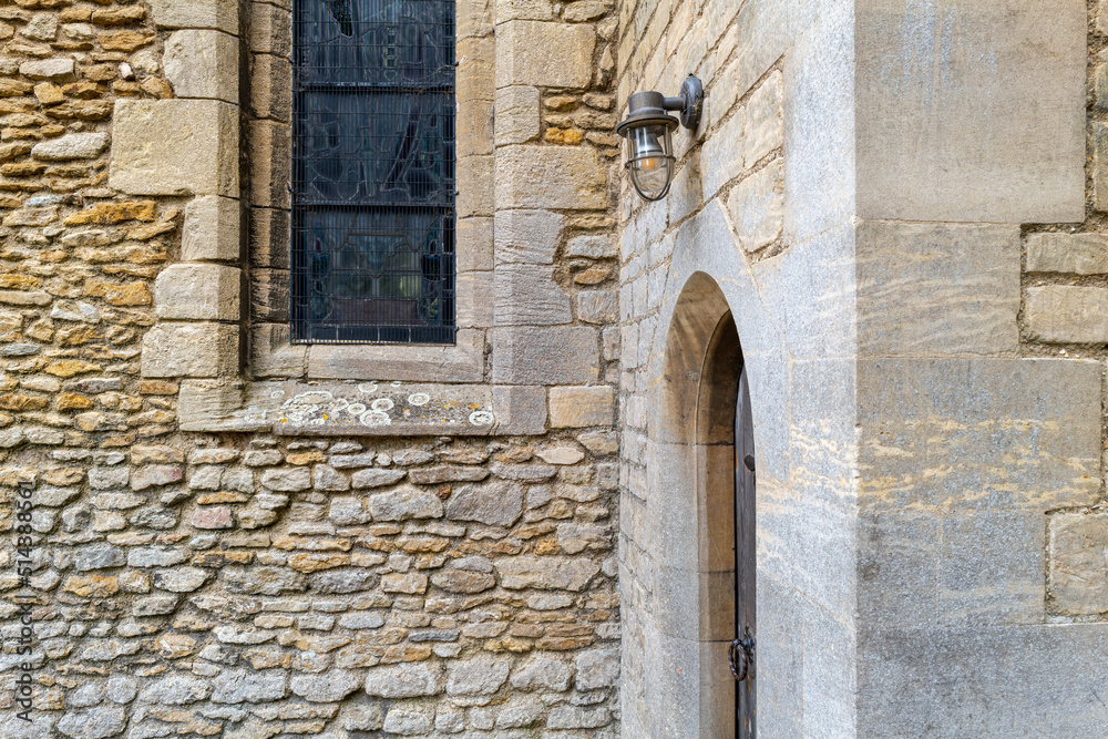 Chapel entrance to an old English church. Seen recently renovated, the small door leads to a crypt. Chapel entrance to an old English church. Seen recently renovated, the small door leads to a crypt.