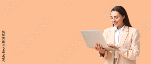 Pretty young businesswoman ...