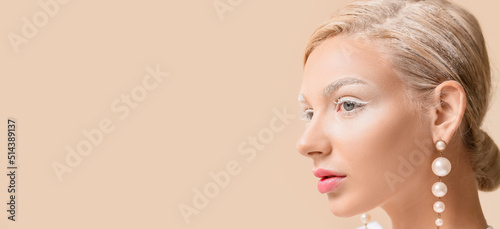 Beautiful young woman with ...