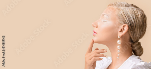 Beautiful young woman with ...