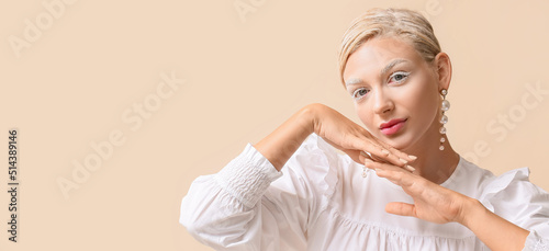 Beautiful young woman with ...
