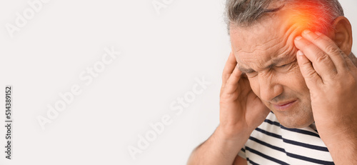 Mature man suffering from h...