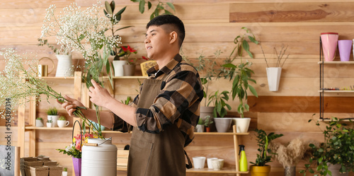 Male Asian florist working ...