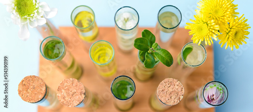 Test tubes with flowers on ...