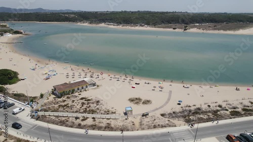 Idyllic Praia da Franquia on bank of Mira River estuary, Portugal; drone photo
