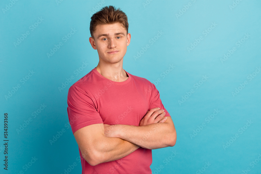 Profile side photo of young handsome man folded hands smart agent representative isolated over blue color background Profile side photo of young handsome man folded hands smart agent representative isolated over blue color background