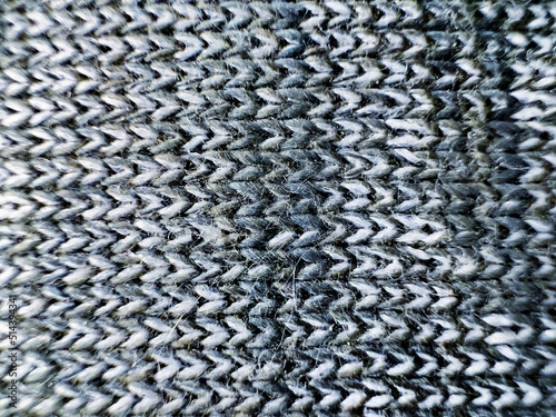 Close-up of the grey wool fabric from above