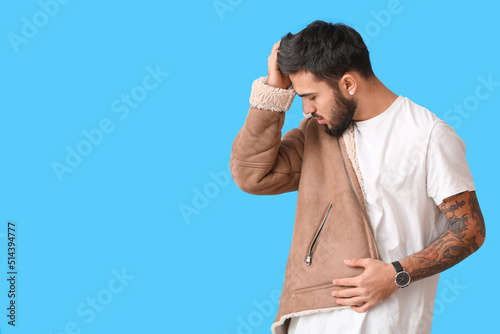 Fashionable bearded man wit...