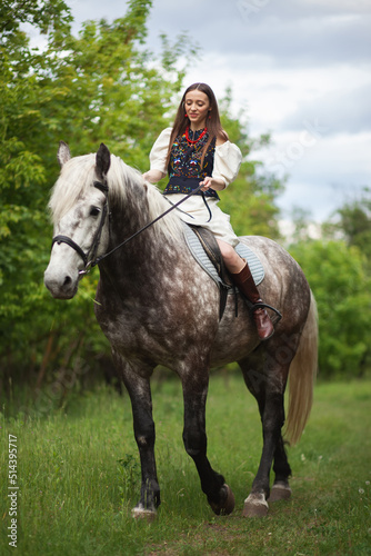 Beautyful woman with horse on nature 