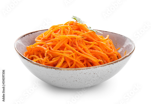 Bowl with tasty korean carrot salad isolated on white background