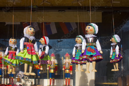 Traditional puppets made of wood at the outdoor market in Bratislava