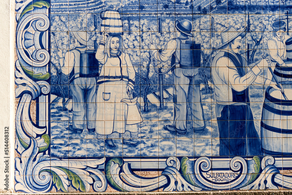 Obraz premium panels of azulejos, tiles, showing the work in the vineyards at the railway station of Peso da Regua, Portugal
