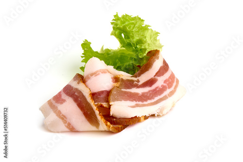 Homemade Bacon, dry cured and air dried, pork belly, smoked pork meat, delicacy food in Ukrainian cuisine, isolated on white background.