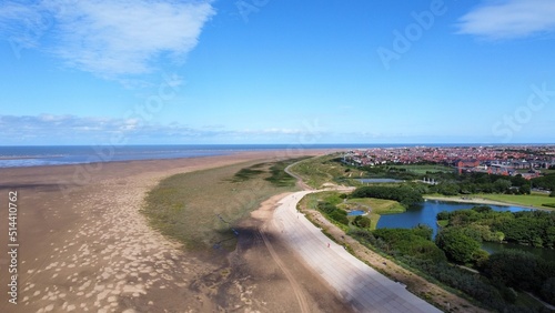 Aerial view of a beach at low tide with the ocean in the distance. Taken in Lytham St Annes Lancashire England. 