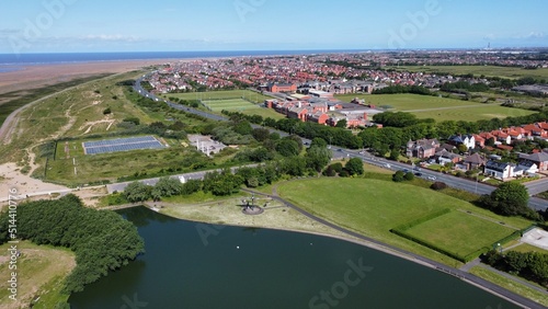 Aerial view of Fairhaven lake in Lytham St Annes with views of the coast in the background. © ReayWorld