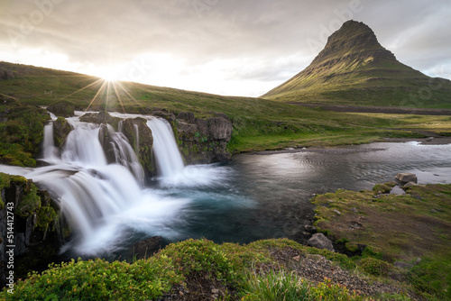 famous Kirkjufell with waterfall during summer