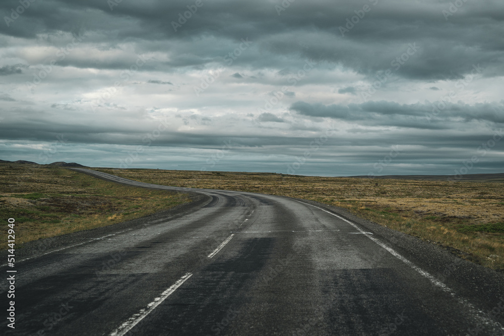 driving on an empty street with icelandic landscape