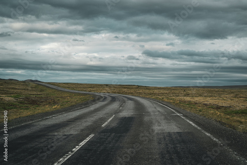 driving on an empty street with icelandic landscape