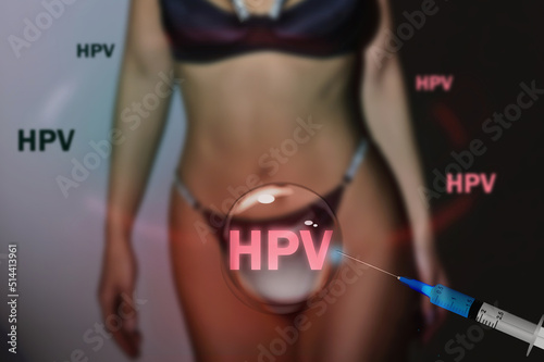 Foto Young sexy woman in a bikini and bodice with a red lettering HPV and a syringe with a vaccine