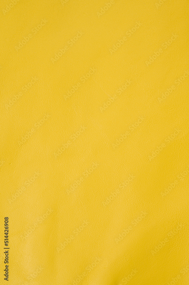 Obraz premium Yellow roll of genuine leather. Wallpaper. Yellow leather for shoes and bags