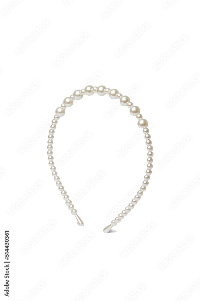 Close-up shot of a thin metal headband with shiny pearl beads. The elegant headband with pearl beads is isolated on a white background. Side view. Close-up shot of a thin metal headband with shiny pearl beads. The elegant headband with pearl beads is isolated on a white background. Side view.