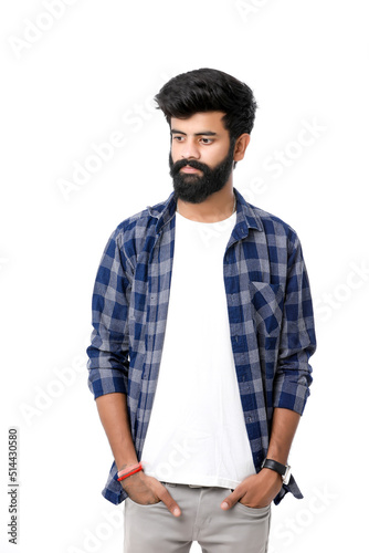 Young indian man giving expression over white background.